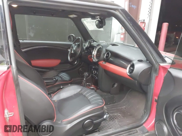 2013 MINI Hardtop S with VIN WMWSV3C50DT392160, listed as a IAAI auction lot 41893232 with 70,922 mi miles and . Bid and sale history available at DreamBid. Image 5.