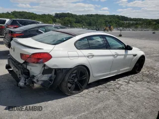 2015 BMW M6 z VIN WBS6C9C52FD467752, wystawiony jako Copart lot #67884554 z przebiegiem 60 729 mil mil oraz Szkody całkowita. Historia ofert i sprzedaży dostępna na DreamBid. Obrazek 3.