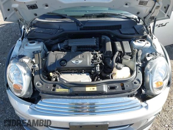 2013 MINI Cooper Hardtop with VIN WMWSU3C56DT683555, listed as a IAAI auction lot 41871323 with 102,527 mi miles. Bid and sale history available at carsss.com. Image 10.