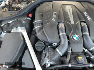 2019 BMW 7 Series 750i xDrive with VIN WBA7F2C5XKB239365, listed as a Copart auction lot 71458315 with 73,685 mi miles and Salvage title. Bid and sale history available at DreamBid. Image 13.