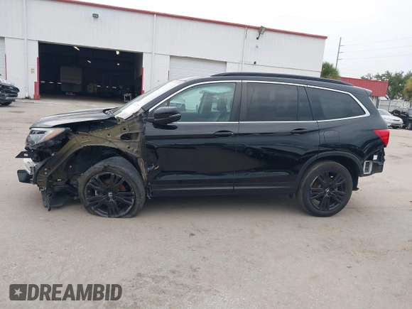 2021 Honda Pilot Special Edition with VIN 5FNYF5H27MB043732, listed as a IAAI auction lot 39777255 with 56,087 mi miles and . Bid and sale history available at DreamBid. Image 14.