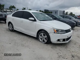 2014 Volkswagen Jetta TDI w/Premium with VIN 3VWLL7AJ2EM266867, listed as a Copart auction lot 52174475 with 73,574 mi miles and Salvage title. Bid and sale history available at DreamBid. Image 4.