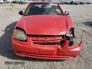 2003 Hyundai Accent with VIN KMHCF35C33U255489, listed as a Copart auction lot 75490604 with 219,457 mi miles and Salvage Title. Bid and sale history available at carsss.com. Image 5.