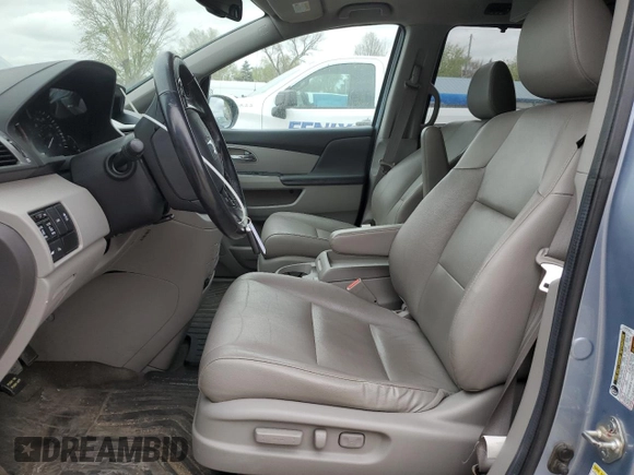 2014 Honda Odyssey Touring with VIN 5FNRL5H90EB007182, listed as a Copart auction lot 51152775 with 152,483 mi miles and Salvage title. Bid and sale history available at DreamBid. Image 7.