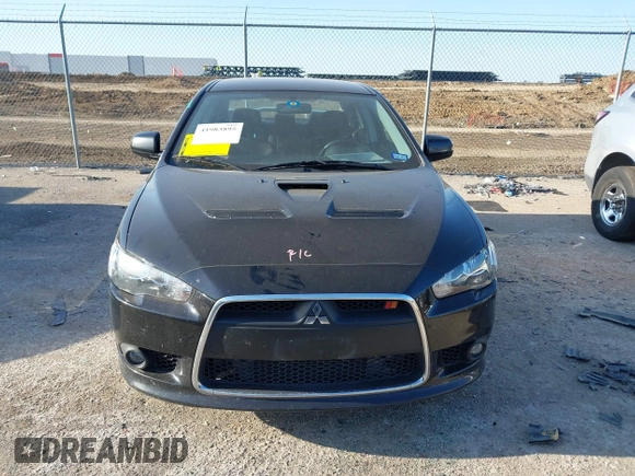 2014 Mitsubishi Lancer Ralliart with VIN JA32V6FVXEU005172, listed as a IAAI auction lot 41983895 with 70,584 mi miles and . Bid and sale history available at DreamBid. Image 12.