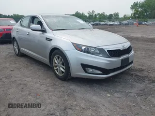 2013 Kia Optima LX z VIN KNAGM4A70D5391680, wystawiony jako IAAI lot #42490136 z przebiegiem 117 712 mil mil oraz . Historia ofert i sprzedaży dostępna na DreamBid. Obrazek 1.
