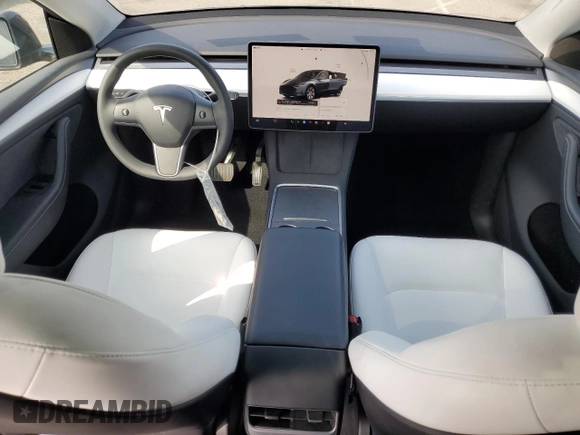 2024 Tesla Model Y Long Range with VIN 7SAYGDEE1RA266653, listed as a Copart auction lot 62277865 with 8,189 mi miles and Salvage title. Bid and sale history available at DreamBid. Image 8.