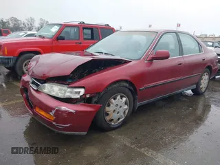 1996 Honda Accord LX with VIN 1HGCD5639TA011773, listed as a IAAI auction lot 41583086 with 148,439 mi miles and . Bid and sale history available at carsss.com. Image 2.
