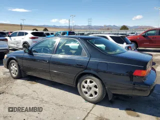 2000 Toyota Camry CE z VIN 4T1BG22K0YU699662, wystawiony jako Copart lot #47949165 z przebiegiem 270 179 mil mil oraz Szkoda całkowita • Salvage title. Historia ofert i sprzedaży dostępna na DreamBid. Obrazek 2.