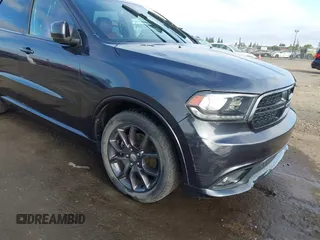2015 Dodge Durango R/T with VIN 1C4SDJCT1FC188401, listed as a IAAI auction lot 42124652 with 86,339 mi miles and . Bid and sale history available at carsss.com. Image 6.