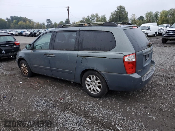 2006 Kia Sedona LX with VIN KNDMB233566097439, listed as a Copart auction lot 77644254 with 124,158 mi miles and Clean Title. Bid and sale history available at carsss.com. Image 2.