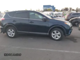 2018 Toyota RAV4 XLE with VIN JTMWFREV2JJ151595, listed as a IAAI auction lot 41380691 with 79,515 mi miles and . Bid and sale history available at carsss.com. Image 13.