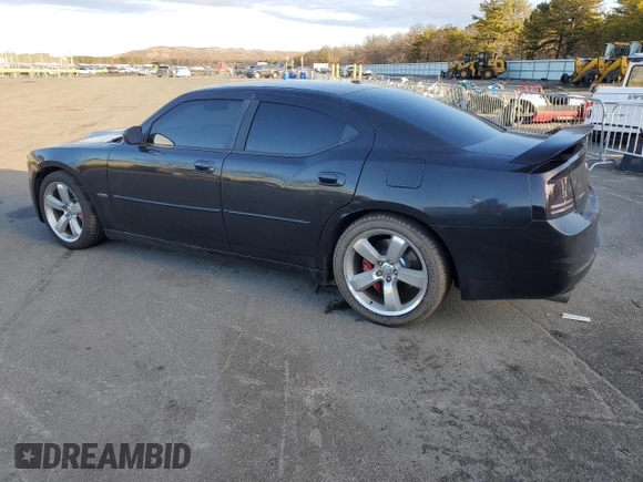 2006 Dodge Charger SRT-8 with VIN 2B3LA73W36H369475, listed as a Copart auction lot 43774705 with 130,495 mi miles and Salvage Title. Bid and sale history available at DreamBid. Image 2.