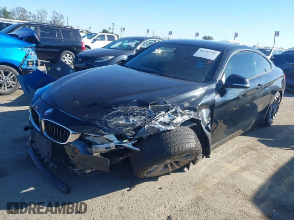 2014 BMW 4 Series 428i with VIN WBA3N7C55EK221259, listed as a IAAI auction lot 41322781 with 100,274 mi miles and . Bid and sale history available at carsss.com. Image 17.