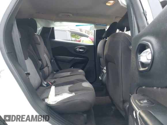 2016 Jeep Cherokee Sport with VIN 1C4PJLAB4GW229799, listed as a IAAI auction lot 41894502 with 117,651 mi miles. Bid and sale history available at carsss.com. Image 8.