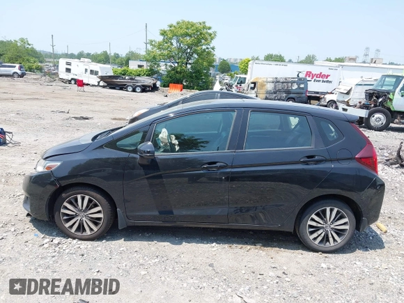 2015 Honda Fit EX-L z VIN 3HGGK5H85FM721566, wystawiony jako IAAI lot #42423777 z przebiegiem 138 825 mil mil oraz . Historia ofert i sprzedaży dostępna na DreamBid. Obrazek 15.