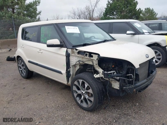 2013 Kia Soul + with VIN KNDJT2A69D7575284, listed as a IAAI auction lot 40777034 with 136,912 mi miles. Bid and sale history available at carsss.com. Image 1.