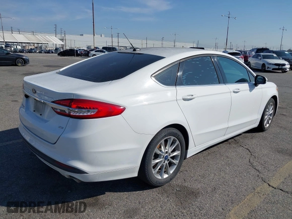 2017 Ford Fusion SE with VIN 3FA6P0H78HR235738, listed as a IAAI auction lot 41604054 with 172,896 mi miles. Bid and sale history available at carsss.com. Image 4.