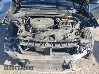 2018 BMW X1 sDrive28i with VIN WBXHU7C30J5L04913, listed as a IAAI auction lot 41755344 with 101,867 mi miles. Bid and sale history available at carsss.com. Image 10.