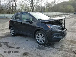 2020 Buick Encore Essence z VIN KL4CJGSB3LB033577, wystawiony jako Copart lot #53960845 z przebiegiem 57 581 mil mil oraz Szkody całkowita. Historia ofert i sprzedaży dostępna na DreamBid. Obrazek 14.