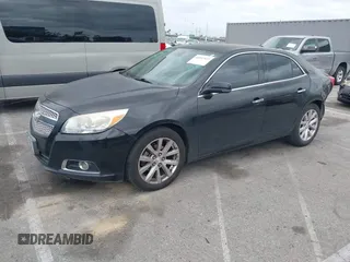 2013 Chevrolet Malibu LTZ with VIN 1G11H5SA2DU125573, listed as a IAAI auction lot 42047422 with 165,493 mi miles and . Bid and sale history available at DreamBid. Image 2.