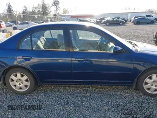 2002 Honda Civic EX with VIN 2HGES26712H500975, listed as a IAAI auction lot 42082728 with 172,407 mi miles and . Bid and sale history available at DreamBid. Image 14.