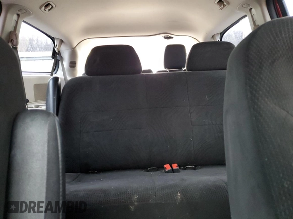 2016 Dodge Grand Caravan SE with VIN 2C4RDGBG9GR109877, listed as a Copart auction lot 52790845 with 141,925 mi miles and Salvage Title. Bid and sale history available at DreamBid. Image 10.