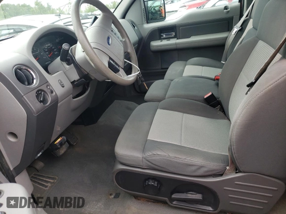 2007 Ford F-150 XLT with VIN 1FTPX14557FA51121, listed as a Copart auction lot 63959045 with 229,314 mi miles and Salvage title. Bid and sale history available at DreamBid. Image 7.
