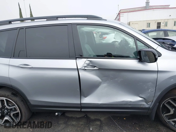 2023 Honda Passport Elite with VIN 5FNYF8H02PB029127, listed as a IAAI auction lot 41166484 with 16,200 mi miles and . Bid and sale history available at DreamBid. Image 13.