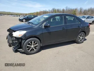 2012 Toyota Yaris with VIN JTDBT4K30CL010867, listed as a Copart auction lot 54128955 with 245,262 mi miles and Salvage Title. Bid and sale history available at carsss.com. Image 1.