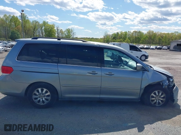 2010 Honda Odyssey EX-L with VIN 5FNRL3H74AB046578, listed as a IAAI auction lot 42049213 with 218,457 mi miles. Bid and sale history available at carsss.com. Image 13.