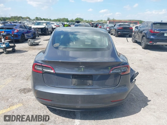 2023 Tesla Model 3 with VIN 5YJ3E1EA3PF623114, listed as a IAAI auction lot 41710385 with 31,663 mi miles and . Bid and sale history available at carsss.com. Image 16.