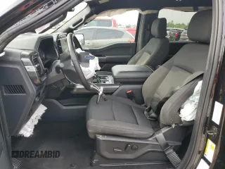 2023 Ford F-150 XL with VIN 1FTEW1C59PFC27499, listed as a Copart auction lot 54453255 with 58,554 mi miles and Salvage title. Bid and sale history available at DreamBid. Image 7.