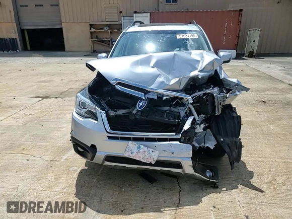 2017 Subaru Forester Touring with VIN JF2SJAWC9HH565195, listed as a Copart auction lot 61631195 with 40,715 mi miles and Salvage title. Bid and sale history available at DreamBid. Image 14.