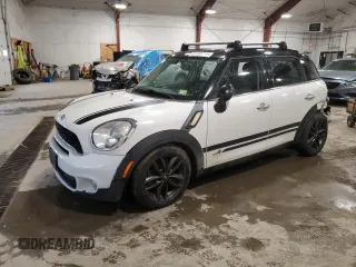 2013 MINI Countryman S ALL4 with VIN WMWZC5C56DWM15763, listed as a Copart auction lot 51165565 with 165,494 mi miles and Salvage Title. Bid and sale history available at DreamBid. Image 1.
