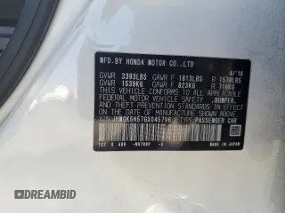 2016 Honda Fit LX z VIN JHMGK5H57GX045796, wystawiony jako Copart lot #59555545 z przebiegiem 94 235 mil mil oraz Szkoda całkowita • Salvage title. Historia ofert i sprzedaży dostępna na DreamBid. Obrazek 13.