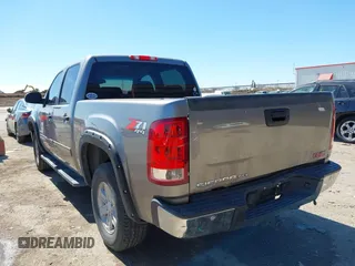 2012 GMC Sierra 1500 SLE with VIN 3GTP2VE78CG198631, listed as a IAAI auction lot 41694471 with 213,361 mi miles and . Bid and sale history available at DreamBid. Image 3.