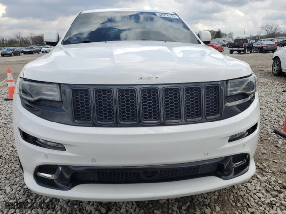 2015 Jeep Grand Cherokee SRT with VIN 1C4RJFDJ3FC918942, listed as a Copart auction lot 52078175 with 115,964 mi miles and Salvage Title. Bid and sale history available at carsss.com. Image 5.