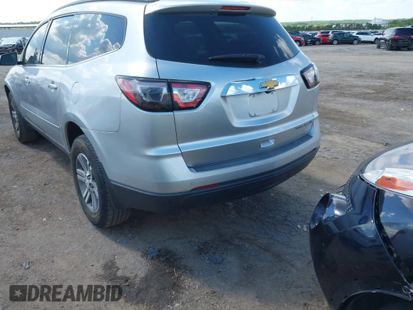 2015 Chevrolet Traverse LT with VIN 1GNKRHKD1FJ359123, listed as a IAAI auction lot 42247341 with 180,189 mi miles and . Bid and sale history available at DreamBid. Image 3.