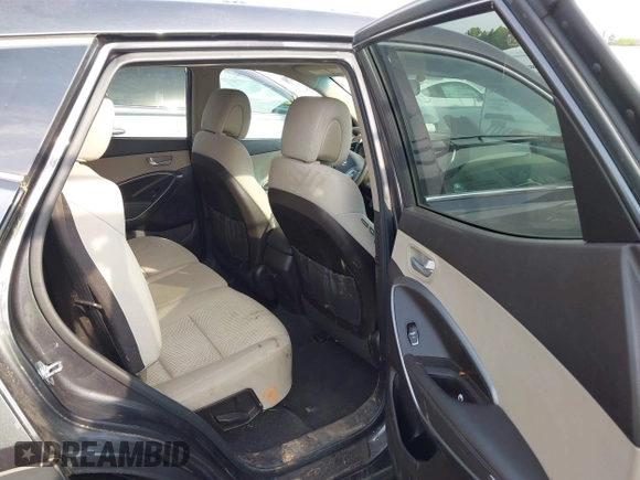 2018 Hyundai Santa Fe 2.4L with VIN 5XYZT3LB0JG525150, listed as a IAAI auction lot 42070377 with 142,418 mi miles and . Bid and sale history available at DreamBid. Image 8.