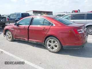 2014 Ford Taurus SEL z VIN 1FAHP2E82EG157445, wystawiony jako IAAI lot #42133676 z przebiegiem 174 616 mil mil oraz . Historia ofert i sprzedaży dostępna na DreamBid. Obrazek 13.