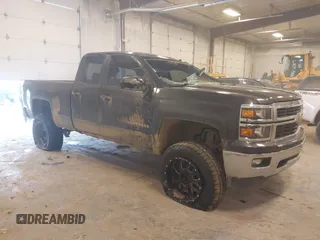 2015 Chevrolet Silverado 1500 LT with VIN 1GCVKRECXFZ354846, listed as a IAAI auction lot 41252244 with 216,467 mi miles. Bid and sale history available at carsss.com. Image 1.