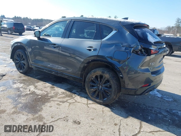 2022 Mazda CX-5 2.5 Turbo with VIN JM3KFBAY1N0526661, listed as a IAAI auction lot 41350659 with 22,963 mi miles and . Bid and sale history available at carsss.com. Image 3.
