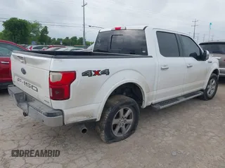 2018 Ford F-150 XL with VIN 1FTEW1EG5JKD32988, listed as a IAAI auction lot 42099086 with 127,541 mi miles. Bid and sale history available at carsss.com. Image 4.