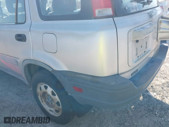 1997 Honda CR-V with VIN JHLRD184XVC014120, listed as a IAAI auction lot 41684375 with 144,915 mi miles. Bid and sale history available at carsss.com. Image 6.