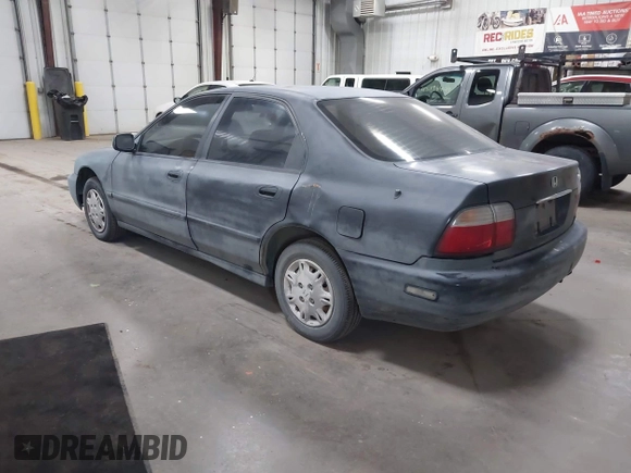 1997 Honda Accord DX with VIN 1HGCD5621VA005525, listed as a IAAI auction lot 42218121 with 196,053 mi miles and . Bid and sale history available at carsss.com. Image 3.