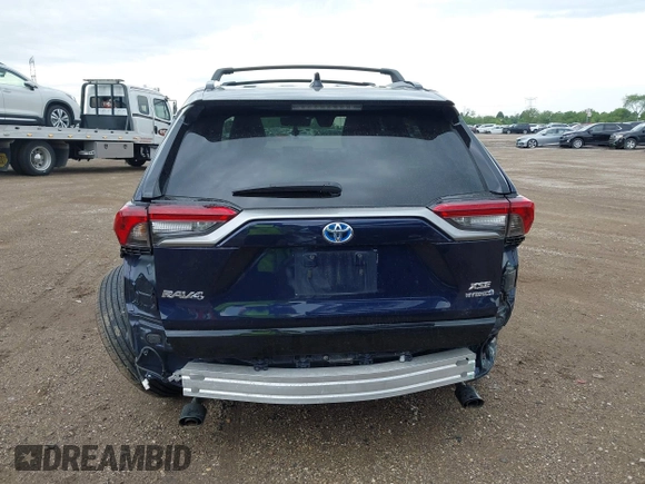 2021 Toyota RAV4 Hybrid XSE with VIN 4T3E6RFV0MU053245, listed as a IAAI auction lot 42426959 with 28,717 mi miles and . Bid and sale history available at DreamBid. Image 16.