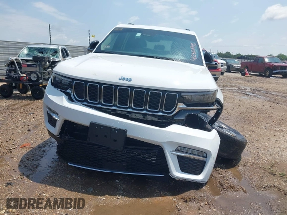 2023 Jeep Grand Cherokee with VIN 1C4RJYB63PC649000, listed as a IAAI auction lot 42306975 with 29,948 mi miles and . Bid and sale history available at DreamBid. Image 12.