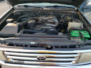 1996 Toyota T100 SR5 z VIN JT4UN24D3T0032313, wystawiony jako Copart lot #70693914 z przebiegiem 210 021 mil mil oraz Szkody całkowita. Historia ofert i sprzedaży dostępna na DreamBid. Obrazek 11.