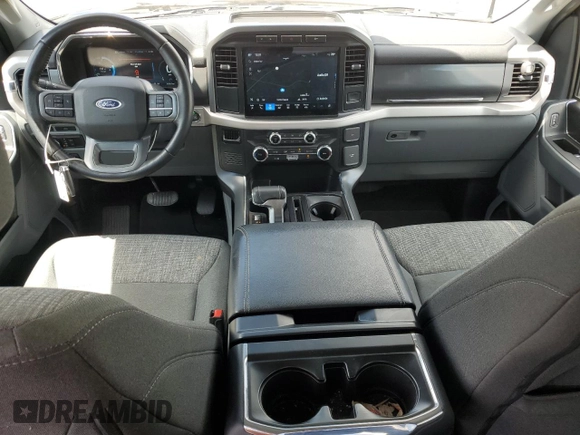 2022 Ford F-150 Lightning Pro z VIN 1FTVW1EL6NWG04931, wystawiony jako Copart lot #59096435 z przebiegiem 26 616 mil mil oraz Szkody całkowita. Historia ofert i sprzedaży dostępna na DreamBid. Obrazek 8.